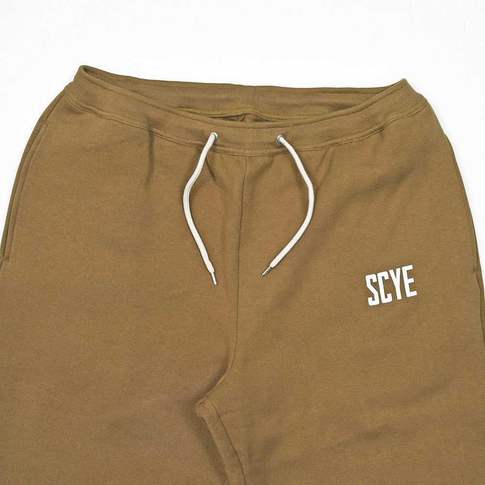 SCYE BASICS(サイベーシックス)フリースバックジャージー スウェットパンツ